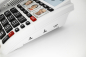 Preview: Verstärktes Notruftelefon mit Notrufarmband Geemarc CL610